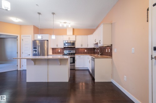 212 8730 82 Avenue, Edmonton, AB - Indoor Photo Showing Kitchen With Stainless Steel Kitchen With Upgraded Kitchen