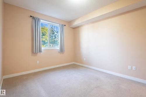 212 8730 82 Avenue, Edmonton, AB - Indoor Photo Showing Other Room