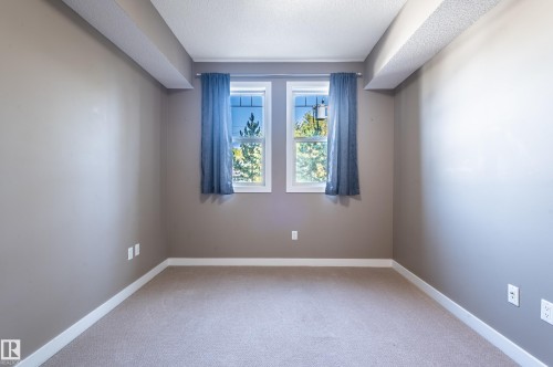 212 8730 82 Avenue, Edmonton, AB - Indoor Photo Showing Other Room