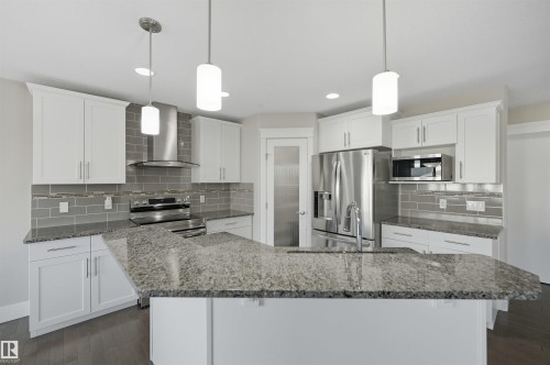 7122 Armour Link Link, Edmonton, AB - Indoor Photo Showing Kitchen With Upgraded Kitchen