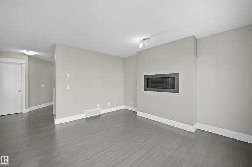 7122 Armour Link Link, Edmonton, AB - Indoor With Fireplace