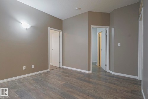 101 4304 139 Avenue Nw, Edmonton, AB - Indoor Photo Showing Other Room