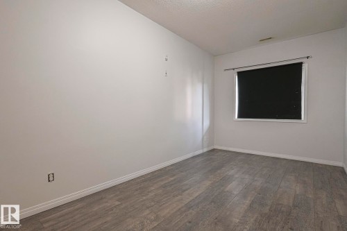 101 4304 139 Avenue Nw, Edmonton, AB - Indoor Photo Showing Other Room