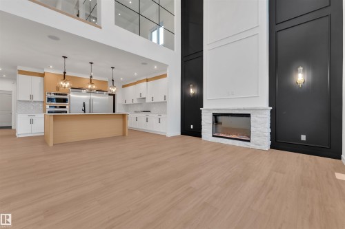 27 Eldridge Point(E), St. Albert, AB - Indoor Photo Showing Other Room With Fireplace