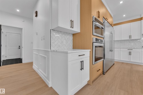 27 Eldridge Point(E), St. Albert, AB - Indoor Photo Showing Kitchen With Upgraded Kitchen