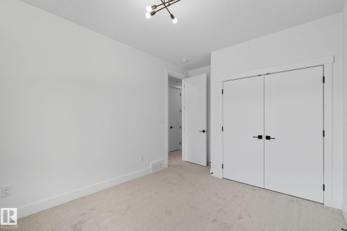 1133 Gyrfalcon Crescent, Edmonton, AB - Indoor Photo Showing Other Room