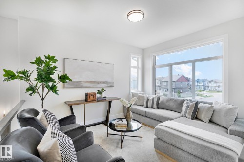 5604 Cautley Cove Cove, Edmonton, AB - Indoor Photo Showing Living Room