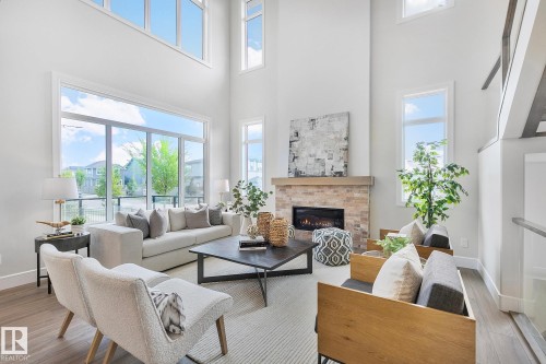 5604 Cautley Cove Cove, Edmonton, AB - Indoor Photo Showing Living Room With Fireplace