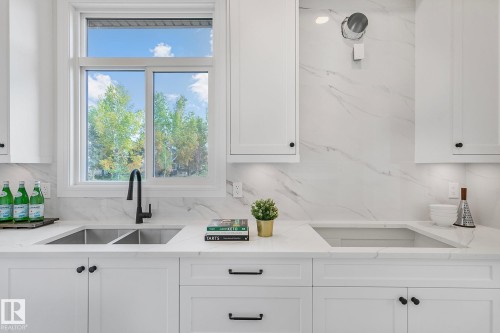 5604 Cautley Cove Cove, Edmonton, AB - Indoor Photo Showing Kitchen With Double Sink