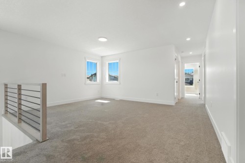1135 Gyrfalcon Crescent, Edmonton, AB - Indoor Photo Showing Other Room