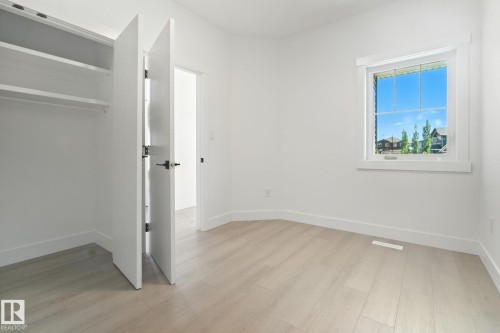 1135 Gyrfalcon Crescent, Edmonton, AB - Indoor Photo Showing Other Room