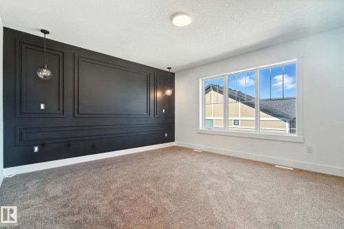 1135 Gyrfalcon Crescent, Edmonton, AB - Indoor Photo Showing Other Room