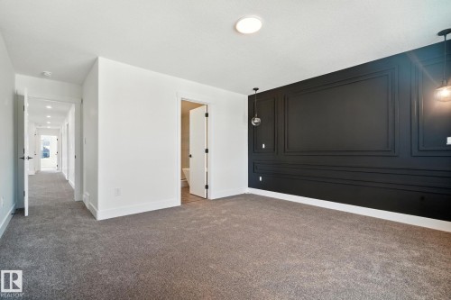 1135 Gyrfalcon Crescent, Edmonton, AB - Indoor Photo Showing Other Room