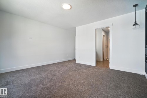 1135 Gyrfalcon Crescent, Edmonton, AB - Indoor Photo Showing Other Room