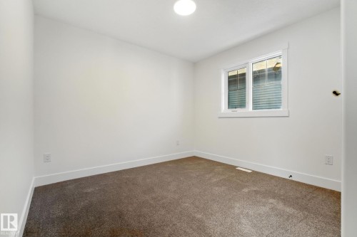1135 Gyrfalcon Crescent, Edmonton, AB - Indoor Photo Showing Other Room