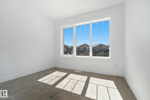 1135 Gyrfalcon Crescent, Edmonton, AB - Indoor Photo Showing Other Room