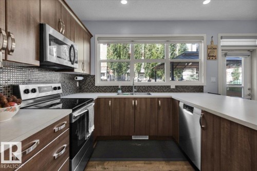 2585 Cole Crescent, Edmonton, AB - Indoor Photo Showing Kitchen With Double Sink