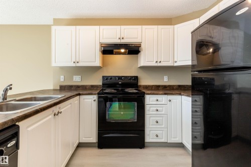 116 5001 62 Street, Beaumont, AB - Indoor Photo Showing Kitchen With Double Sink