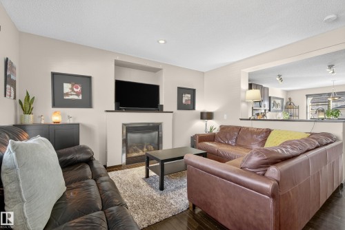 3623 13 Street, Edmonton, AB - Indoor Photo Showing Living Room With Fireplace