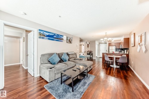 104 10118 106 Avenue, Edmonton, AB - Indoor Photo Showing Living Room