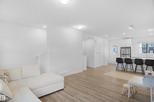 19 903 Crystallina Nera Way, Edmonton, AB - Indoor Photo Showing Living Room