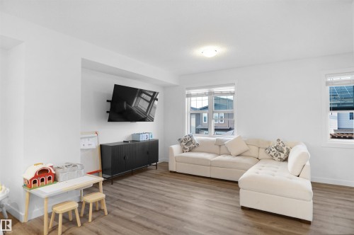 19 903 Crystallina Nera Way, Edmonton, AB - Indoor Photo Showing Living Room