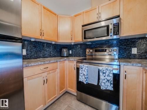 431 11603 Ellerslie Road, Edmonton, AB - Indoor Photo Showing Kitchen