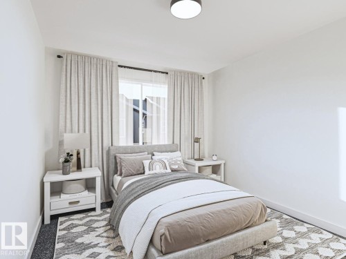 7 710 Mattson Drive, Edmonton, AB - Indoor Photo Showing Bedroom