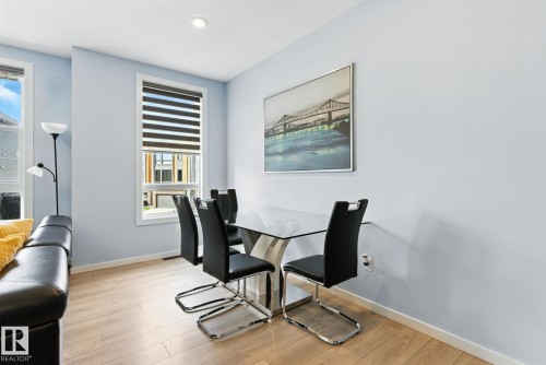 105 1304 Rutherford Rd, Edmonton, AB - Indoor Photo Showing Dining Room