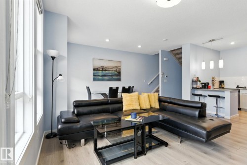 105 1304 Rutherford Rd, Edmonton, AB - Indoor Photo Showing Living Room