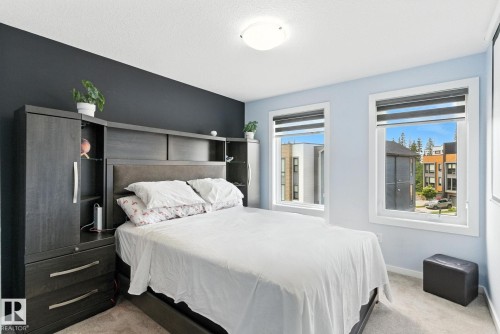105 1304 Rutherford Rd, Edmonton, AB - Indoor Photo Showing Bedroom