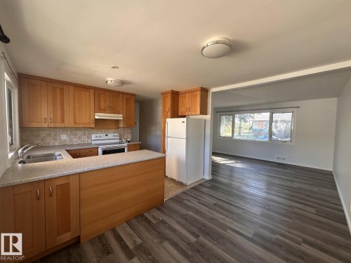 7504 77 Avenue, Edmonton, AB - Indoor Photo Showing Kitchen With Double Sink