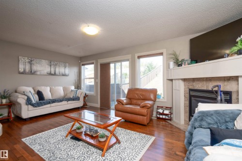 3533 11 Street, Edmonton, AB - Indoor Photo Showing Living Room With Fireplace