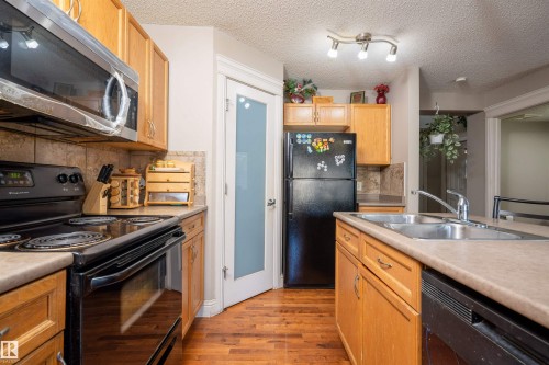 3533 11 Street, Edmonton, AB - Indoor Photo Showing Kitchen With Double Sink