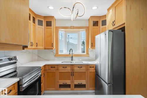 13043 Sherbrooke Avenue, Edmonton, AB - Indoor Photo Showing Kitchen With Stainless Steel Kitchen With Double Sink
