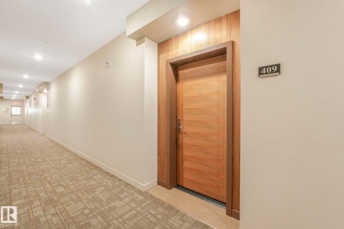 409 625 Leger Way Nw, Edmonton, AB - Indoor Photo Showing Other Room