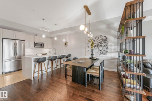 409 625 Leger Way Nw, Edmonton, AB - Indoor Photo Showing Kitchen With Upgraded Kitchen