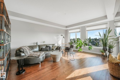 409 625 Leger Way Nw, Edmonton, AB - Indoor Photo Showing Living Room