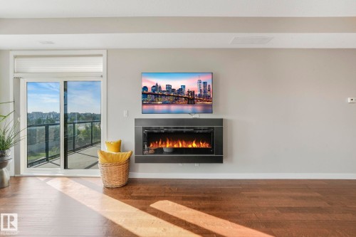 409 625 Leger Way Nw, Edmonton, AB - Indoor Photo Showing Living Room With Fireplace