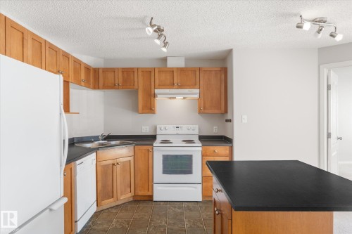 1302 330 Clareview Station Drive, Edmonton, AB - Indoor Photo Showing Kitchen With Double Sink