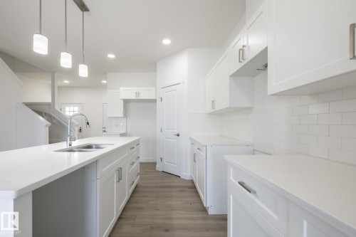 8639 97 Avenue, Morinville, AB - Indoor Photo Showing Kitchen With Double Sink