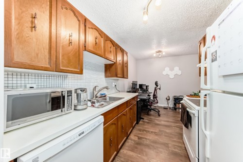305 14004 26 Street, Edmonton, AB - Indoor Photo Showing Kitchen With Double Sink