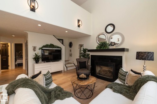 304 14 Mission Avenue, St. Albert, AB - Indoor Photo Showing Living Room With Fireplace