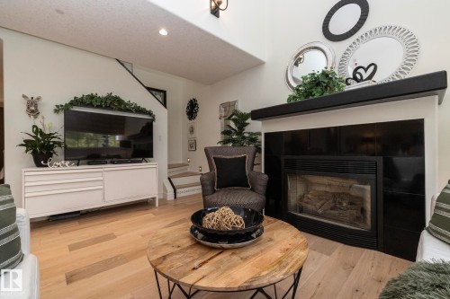 304 14 Mission Avenue, St. Albert, AB - Indoor Photo Showing Living Room With Fireplace