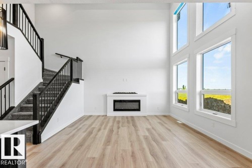 5018 53 Ave, Calmar, AB - Indoor With Fireplace