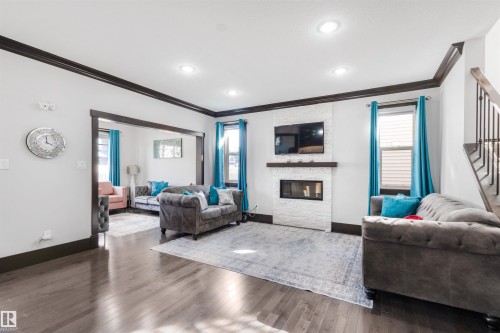 3223 Allan Way, Edmonton, AB - Indoor Photo Showing Living Room With Fireplace