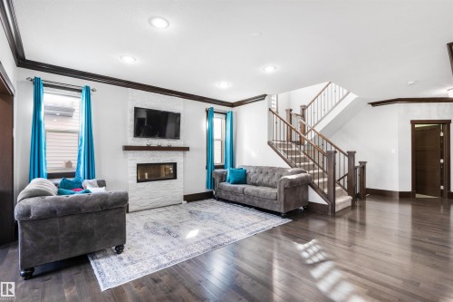 3223 Allan Way, Edmonton, AB - Indoor Photo Showing Living Room With Fireplace