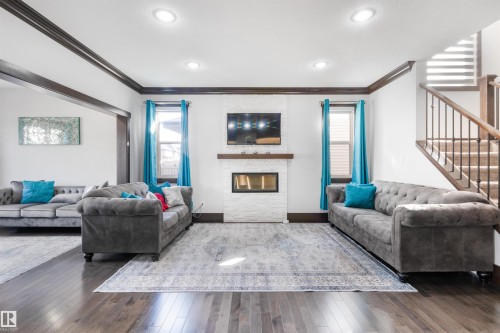 3223 Allan Way, Edmonton, AB - Indoor Photo Showing Living Room With Fireplace