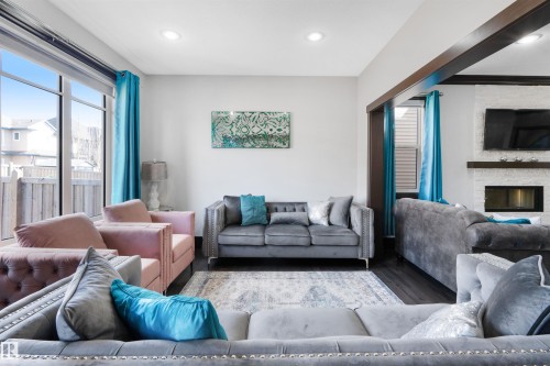 3223 Allan Way, Edmonton, AB - Indoor Photo Showing Living Room With Fireplace