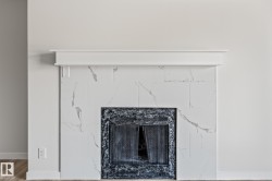 Detailed view of baseboards and wood finished floors - 